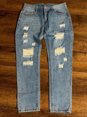 Womenβs Light Blue Distressed Ripped Jeans